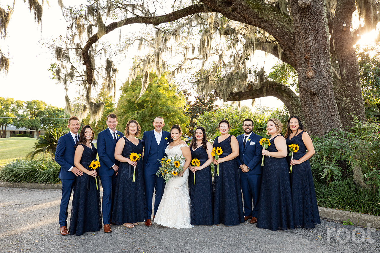 Wedding party in navy with sunflowers