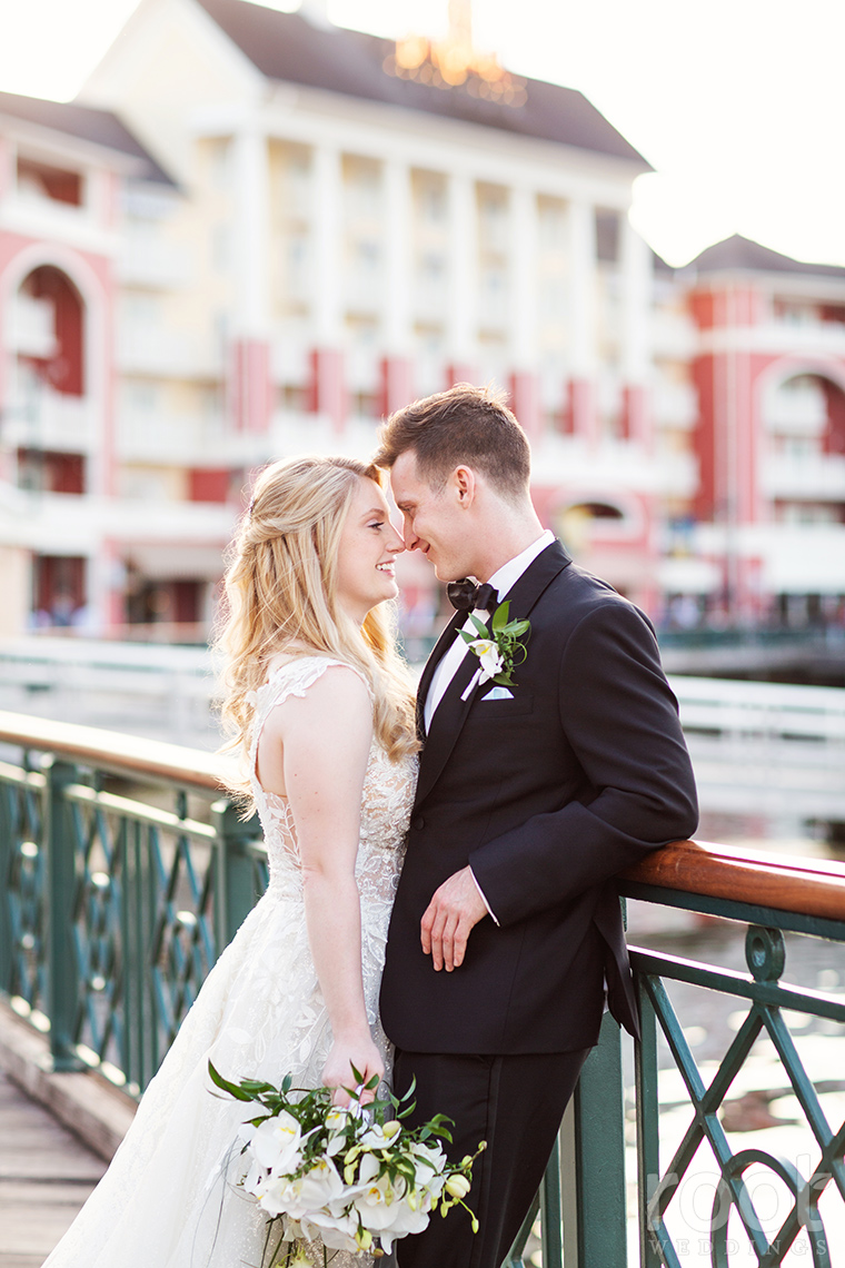 Sunset wedding photos at Disney's Boardwalk Inn Resort.