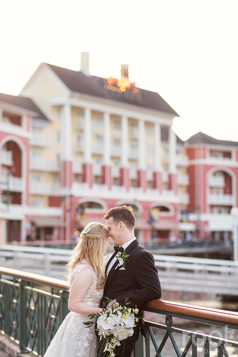 Sunset wedding photos at Disney's Boardwalk Inn Resort.