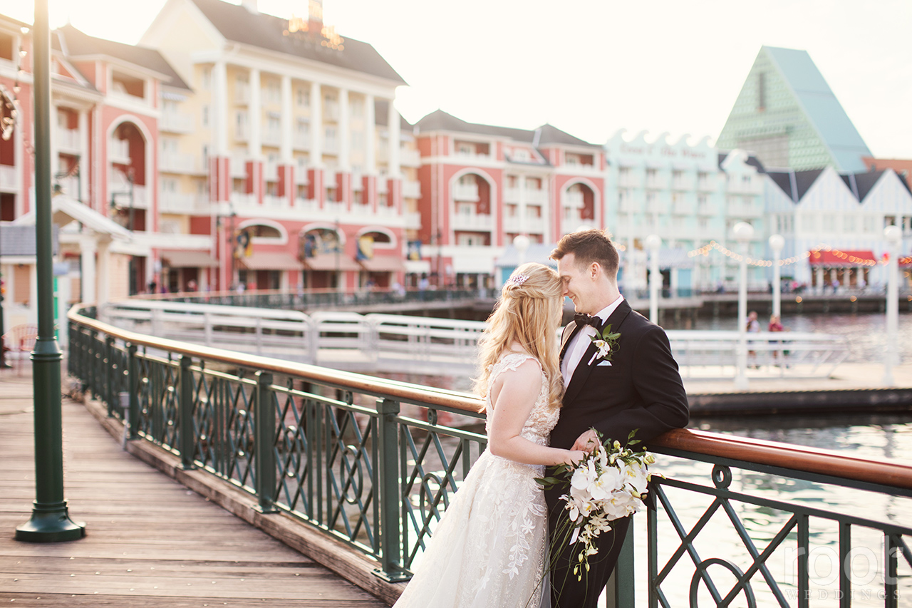 Sunset wedding photos at Disney's Boardwalk Inn Resort.