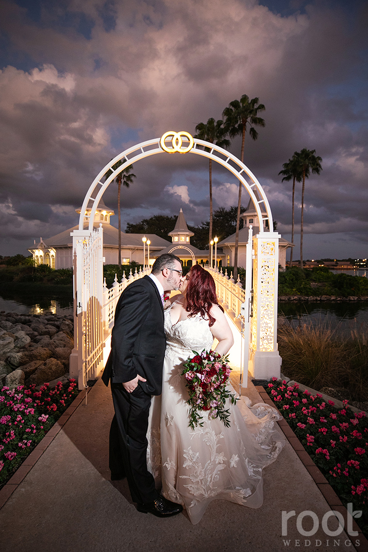 Bride and groom at sunset at Disney's Wedding Pavilion