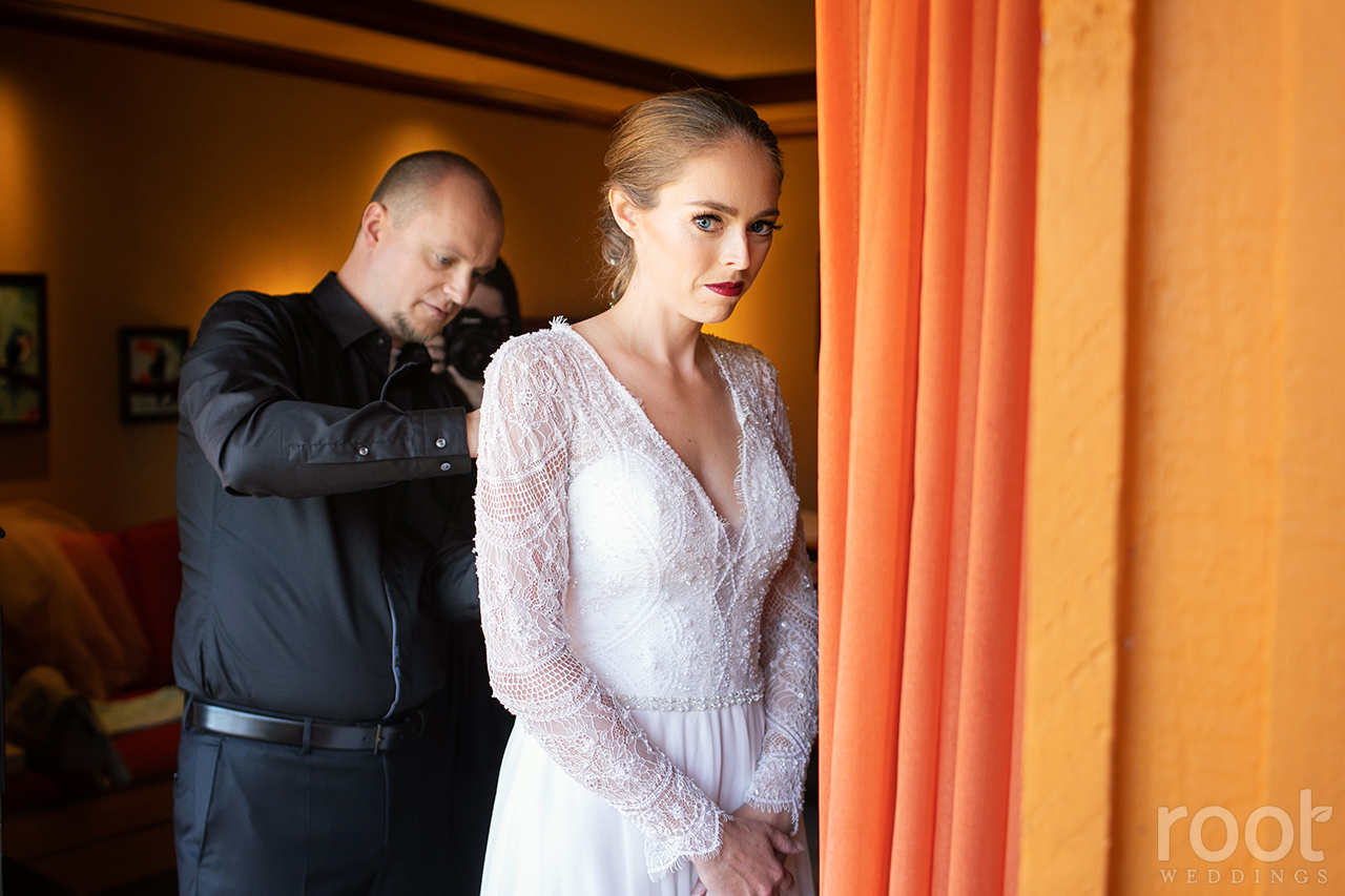 Bride and groom getting ready together