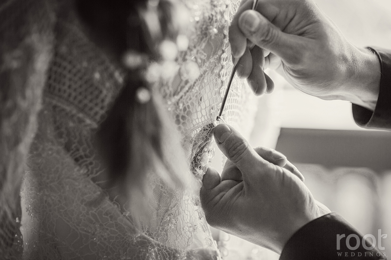 Bride and groom getting ready together