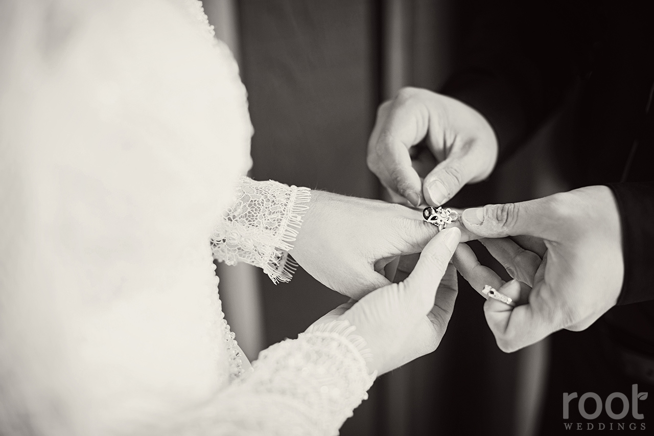 Bride and groom getting ready together