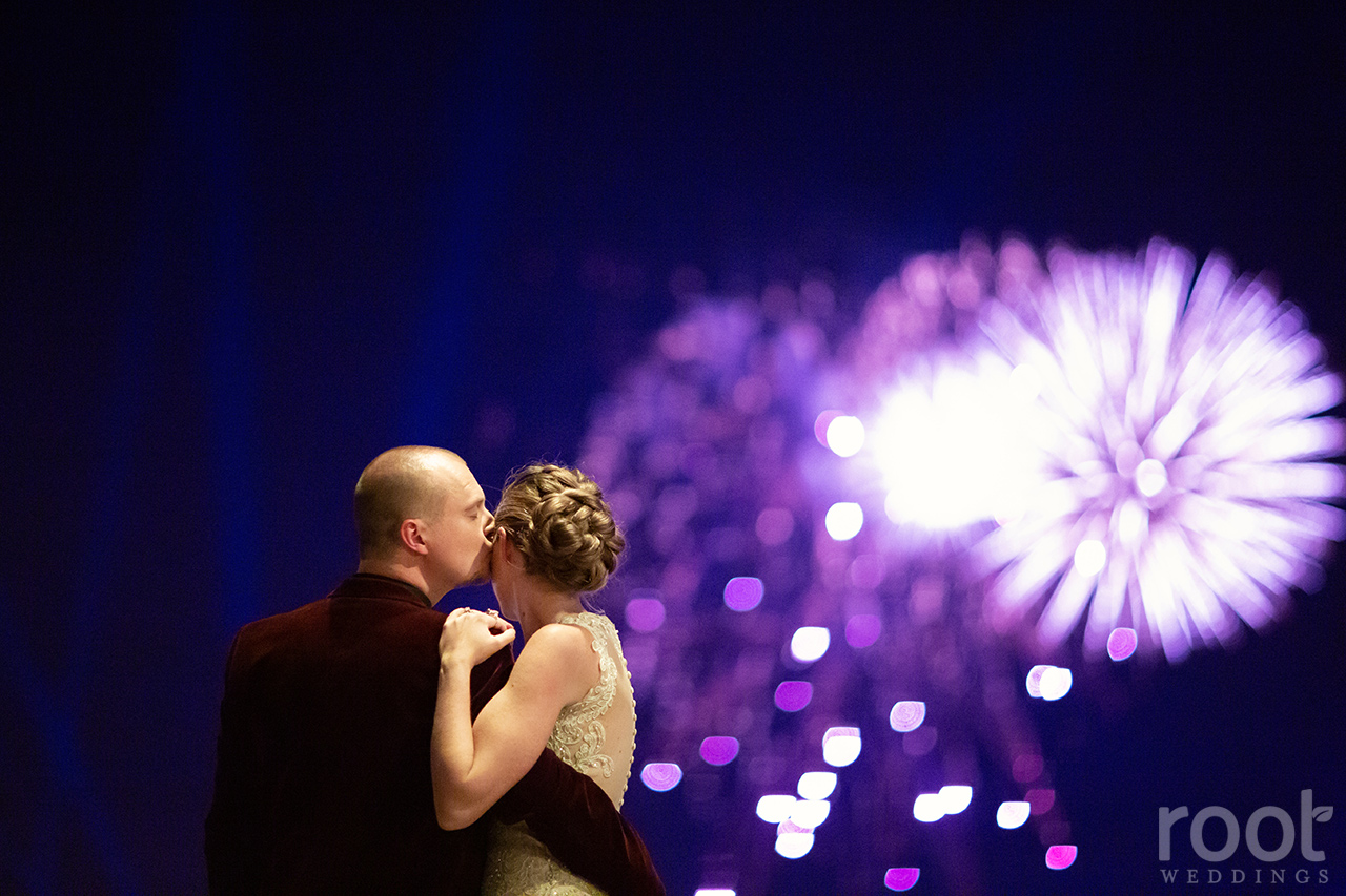 Bride and groom with Disney fireworks